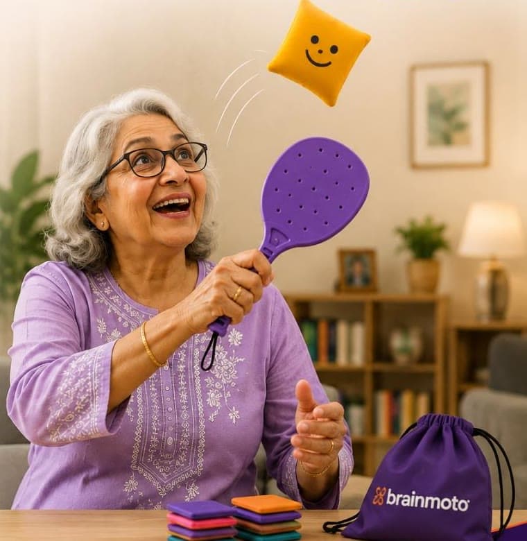 An older woman smiling during a Jolly activity